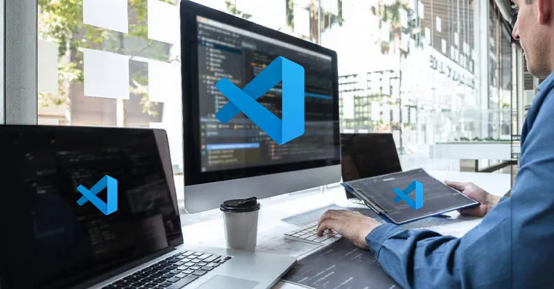 Image, photo d'un bureau de développeur avec le logo VS Code ou Visual Studio Code.