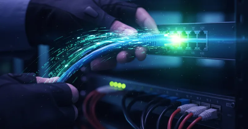 Serveur FTP : image ou photo de câble réseau connecté à un serveur ou routeur.