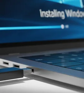 Clé USB bootable : image ou photo d'une clé USB branchée avec écran d’installation en arrière-plan.