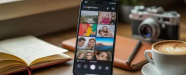 Google Photos : image ou photo d'un smartphone posé sur une table avec l’application Google Photos ouverte montrant une galerie colorée.